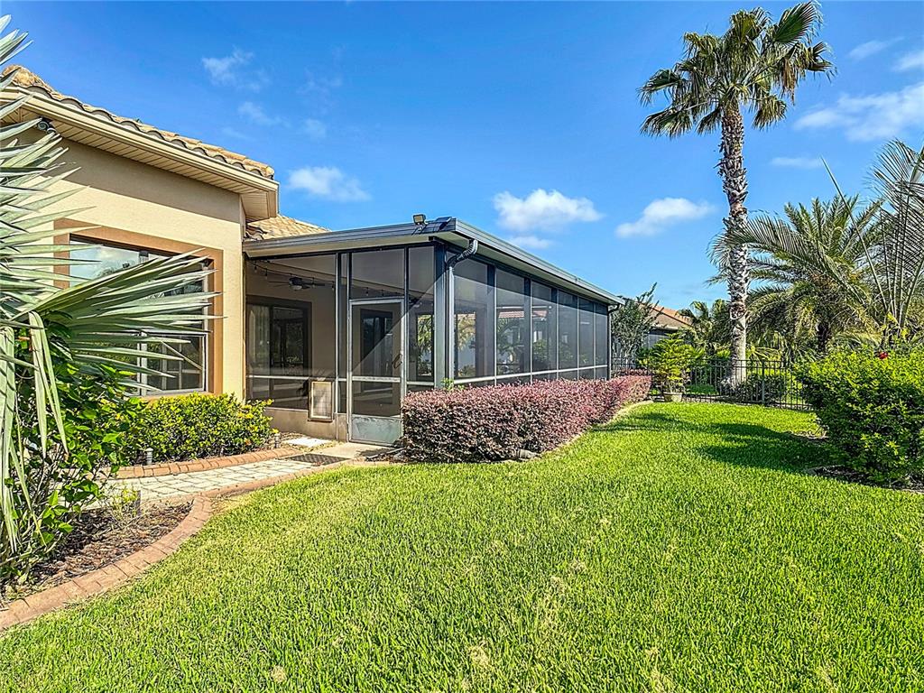 772 San Raphael Street Kissimmee, FL 34759 - Photo 79 of 94 a view of house with a yard