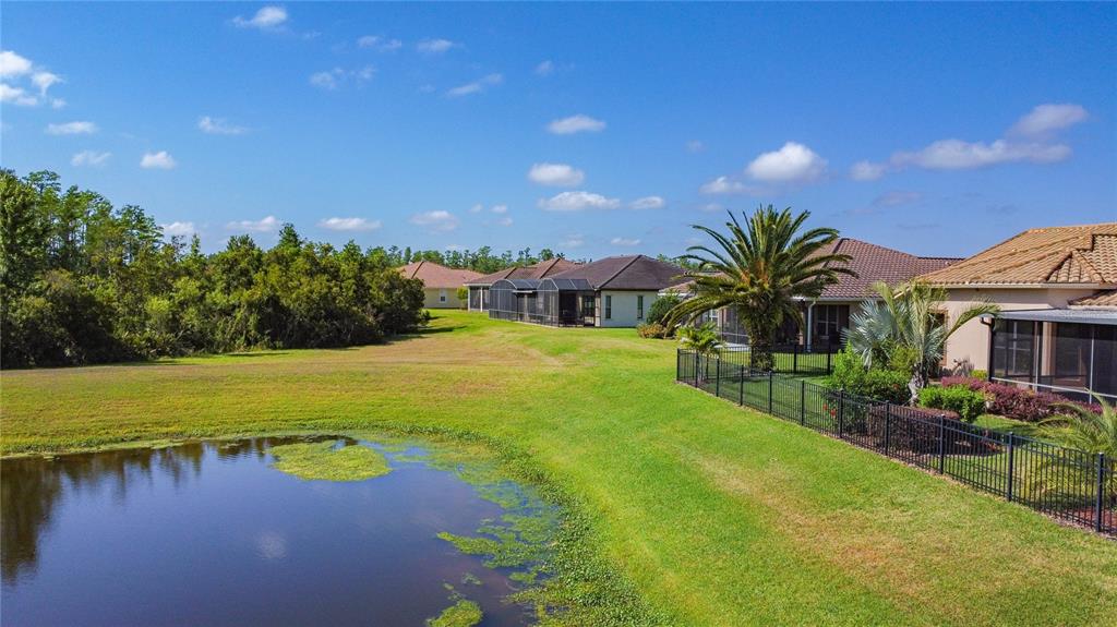 772 San Raphael Street Kissimmee, FL 34759 - Photo 89 of 94 a view of a lake with a big yard