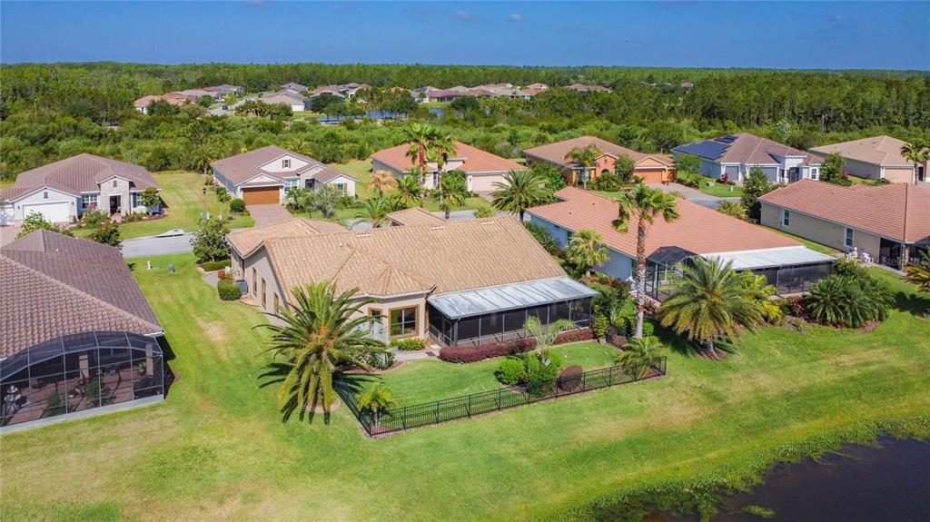 772 San Raphael Street Kissimmee, FL 34759 - Photo 94 of 94 an aerial view of residential houses with outdoor space and trees