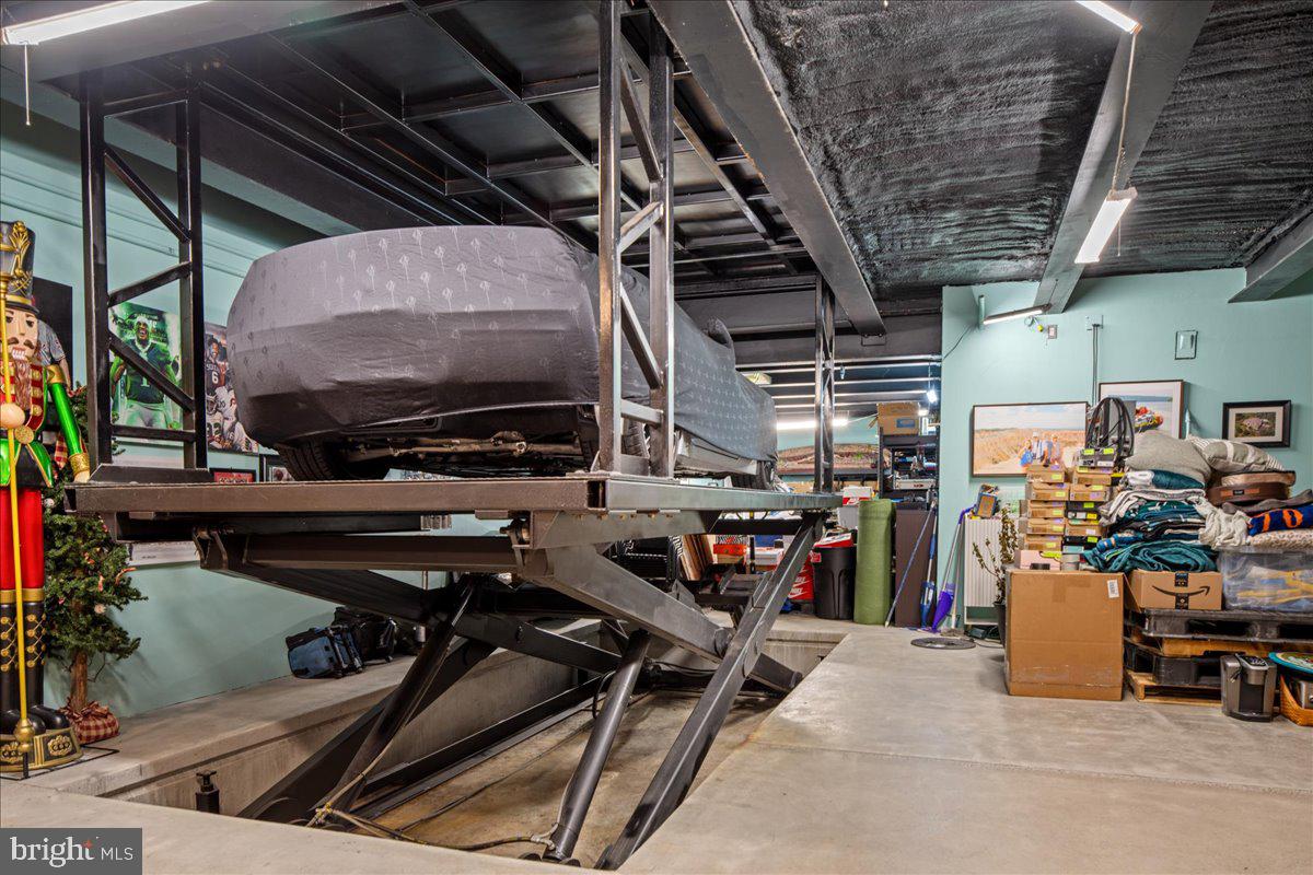 182 South Main Street New Hope, PA 18938 - Photo 50 of 74 Car lift from garage to basement