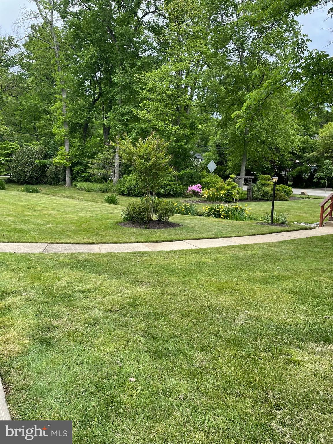 420 North Wayne Avenue, Unit 8 Wayne, PA 19087 - Photo 15 of 18 a view of a golf course with a lake