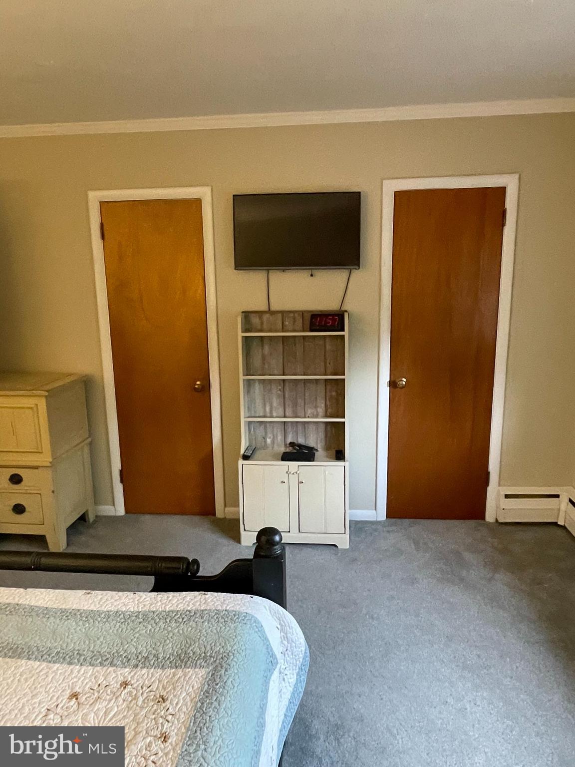 420 North Wayne Avenue, Unit 8 Wayne, PA 19087 - Photo 9 of 18 a bedroom with a bed and a window