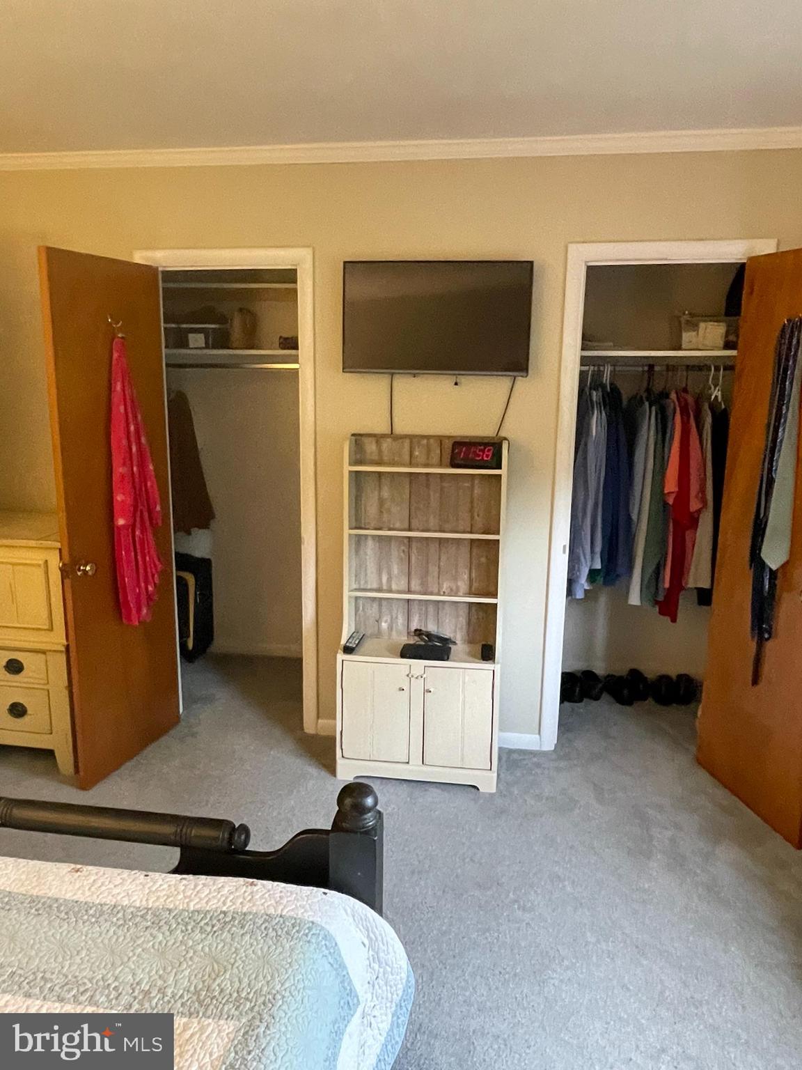 420 North Wayne Avenue, Unit 8 Wayne, PA 19087 - Photo 10 of 18 a view of walk in closet with clothes and shoes