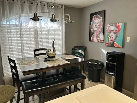 a view of a workspace with furniture