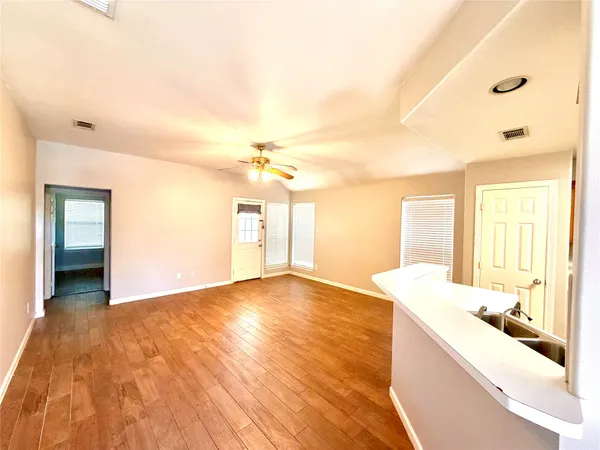 a view of a bathroom with a sink and a bathtub