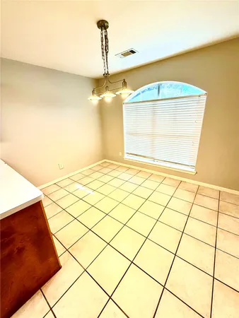 a view of a room with a window
