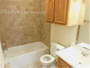 a bathroom with a sink and a bathtub