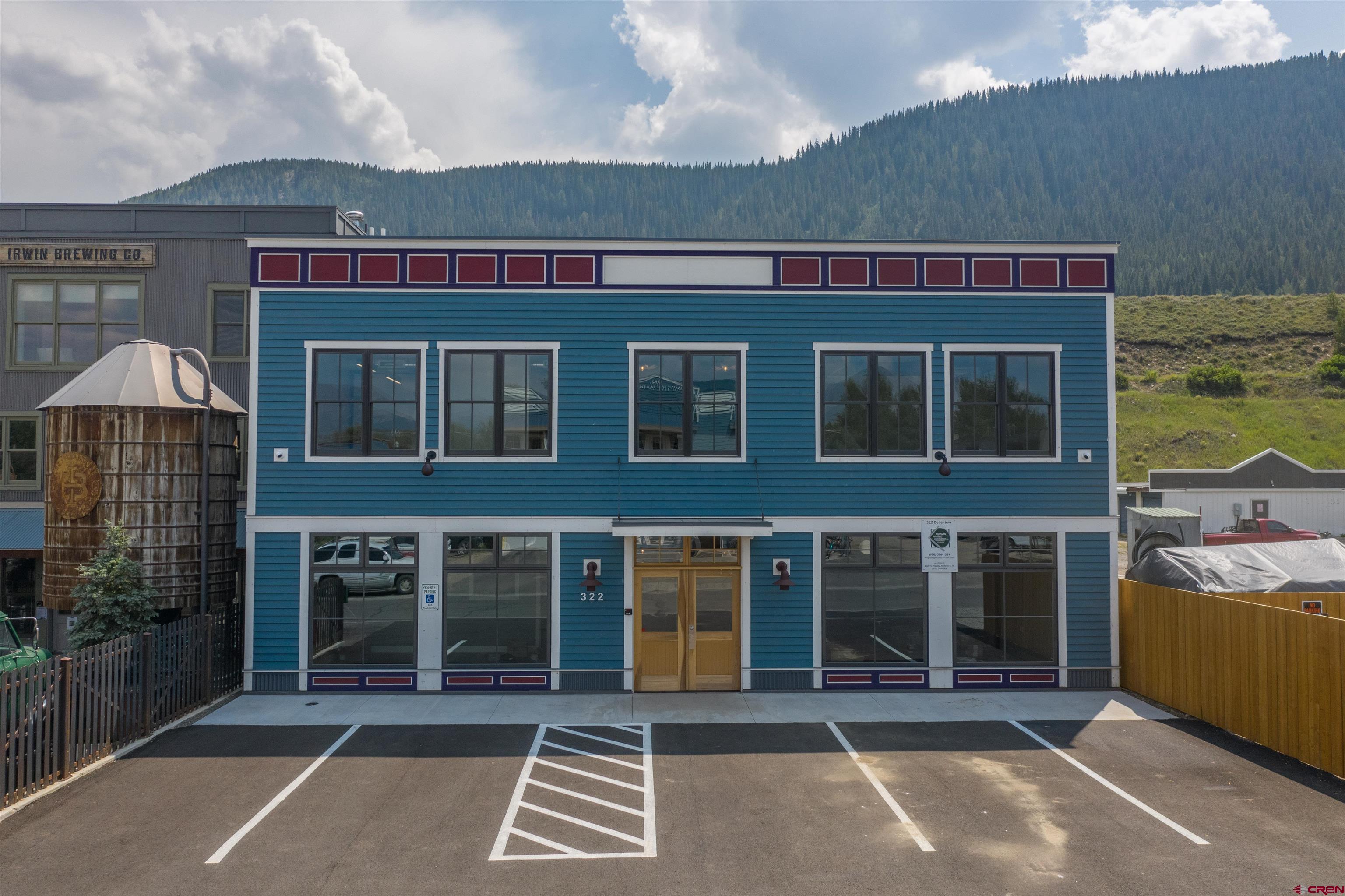 322 Belleview Avenue Crested Butte, CO 81224 - Photo 1 of 43 a view of a building with a barbeque grill and a fireplace