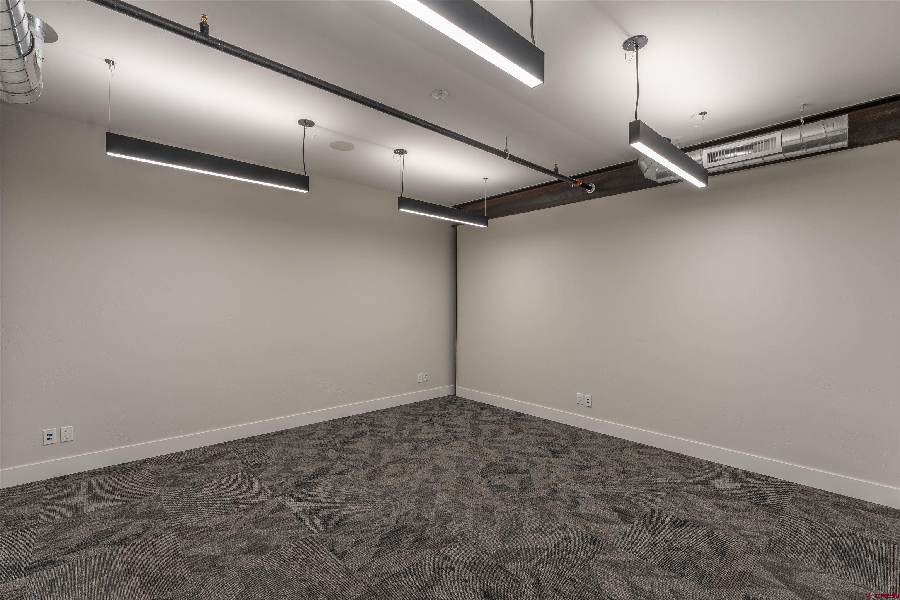 322 Belleview Avenue Crested Butte, CO 81224 - Photo 32 of 43 an empty room with windows
