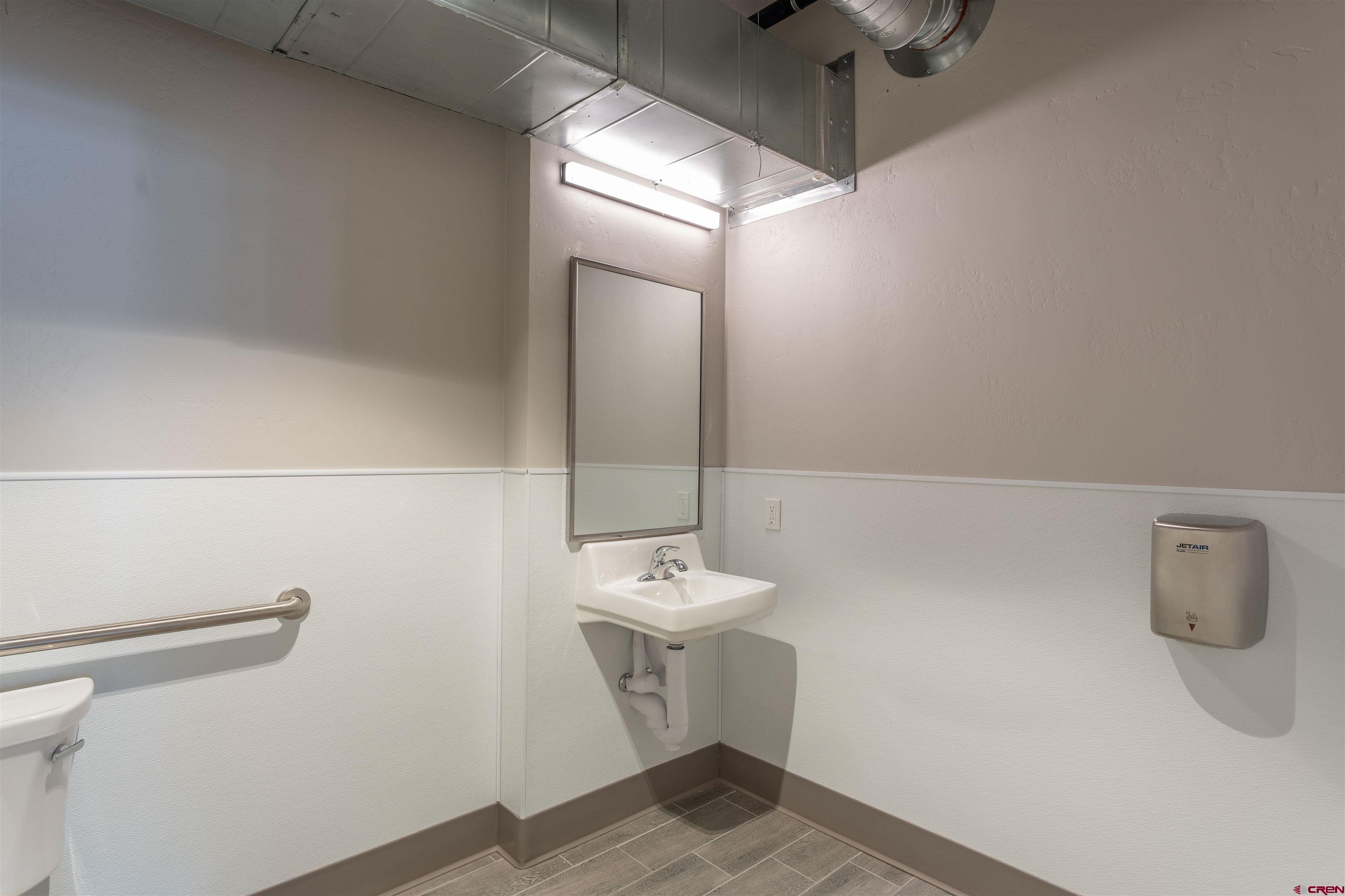 322 Belleview Avenue Crested Butte, CO 81224 - Photo 33 of 43 a bathroom with a sink and a mirror