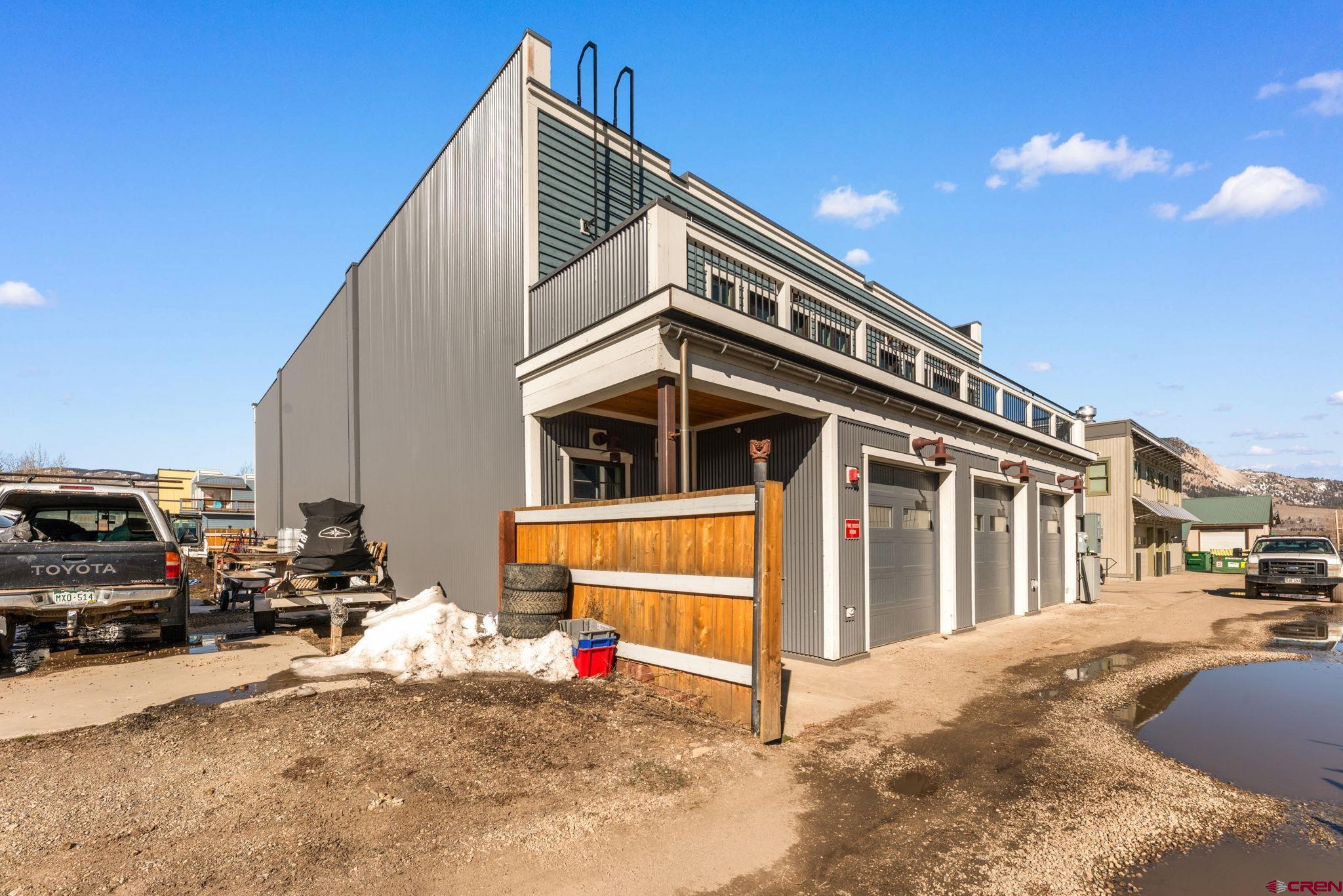 322 Belleview Avenue Crested Butte, CO 81224 - Photo 41 of 43 a view of a house with a patio