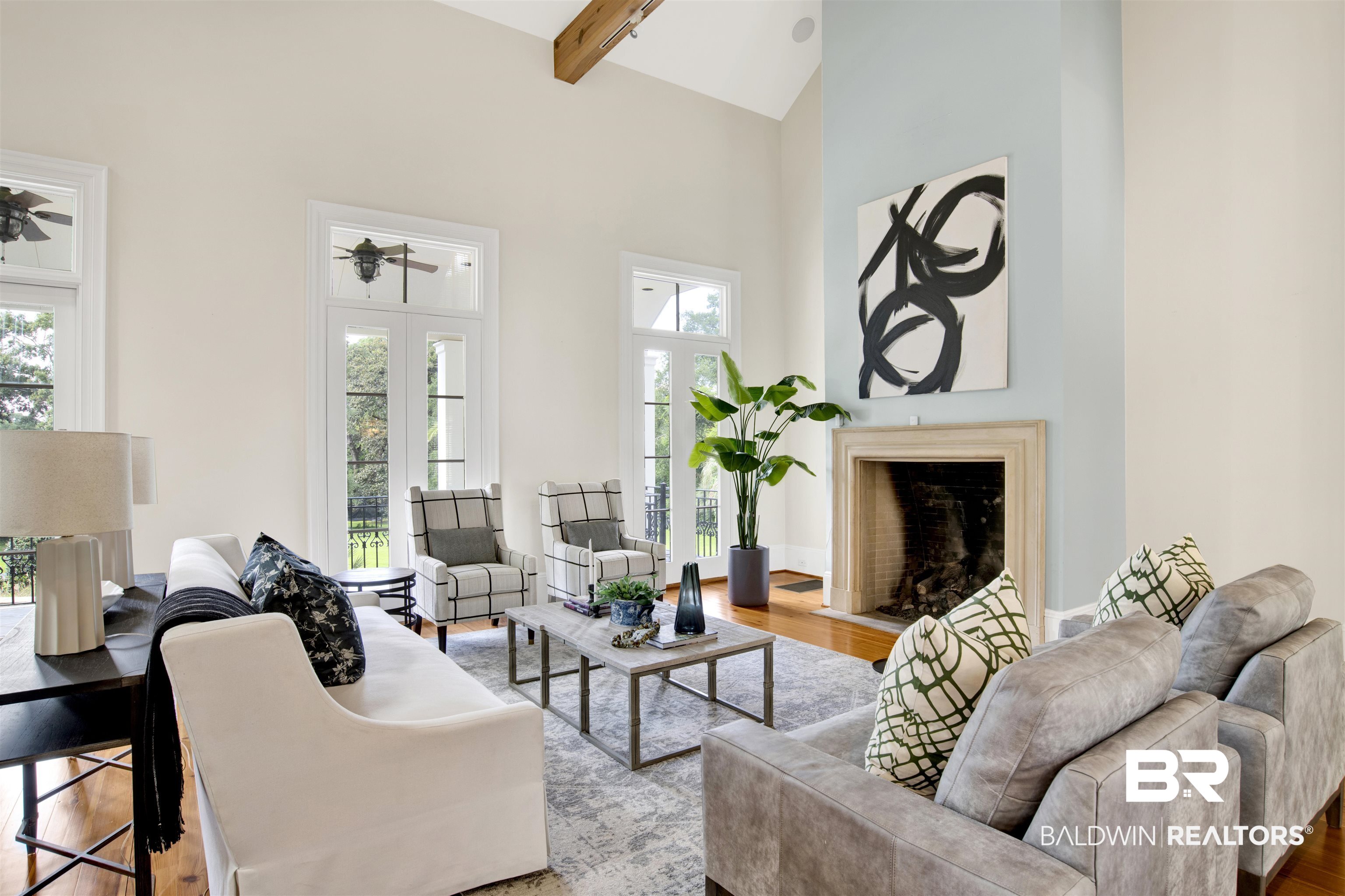 3816 Austill Lane Mobile, AL 36608 - Photo 16 of 80 Living room featuring a fireplace with flush hearth, high vaulted ceiling, beamed ceiling, and wood finished floors