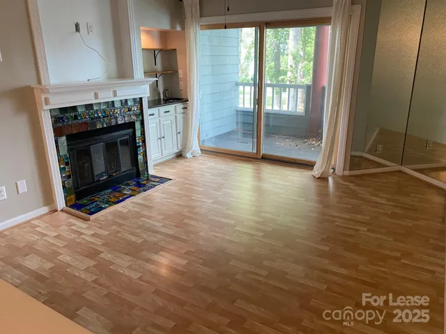 a view of a livingroom with a fireplace