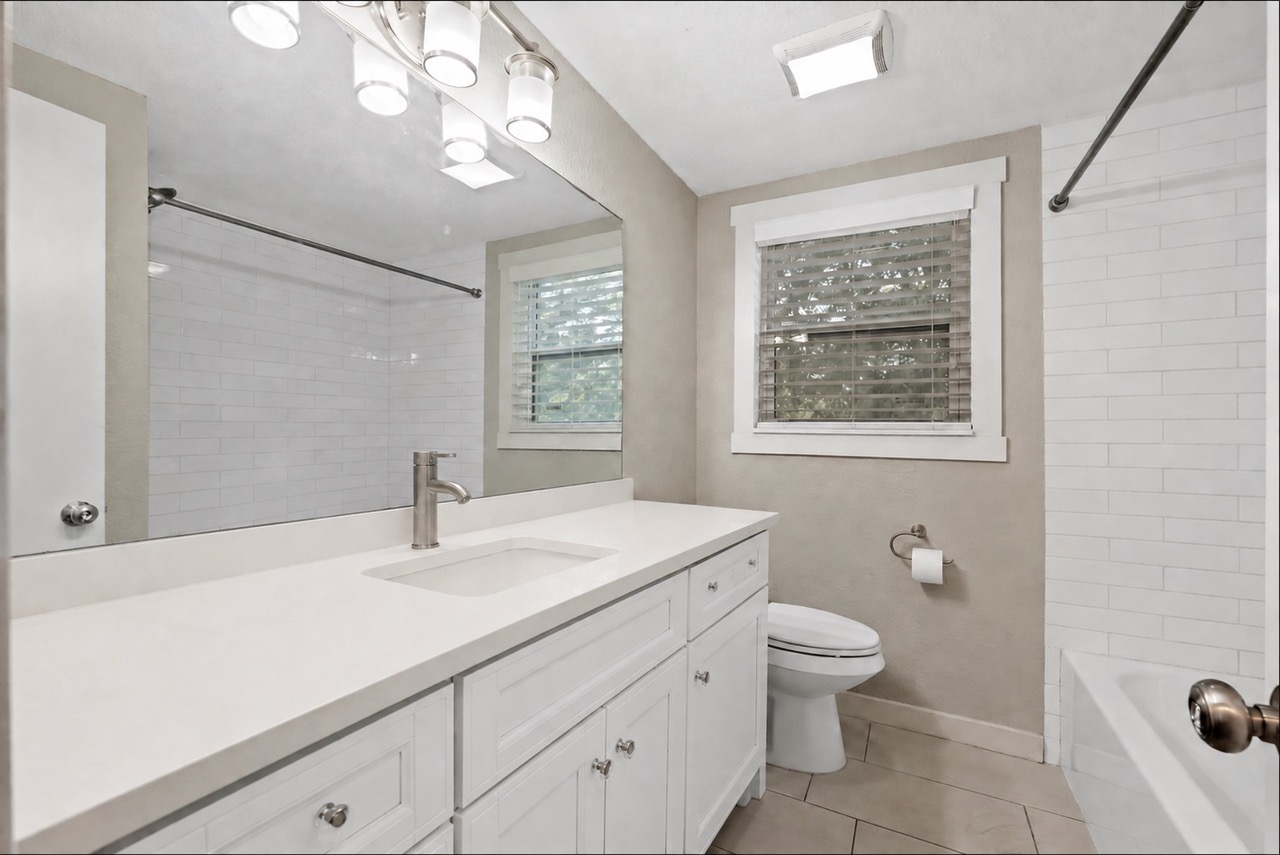 1801 Ohlen Road Austin, TX 78757 - Photo 23 of 32 AI rendered upstairs bathroom photo to show potential.