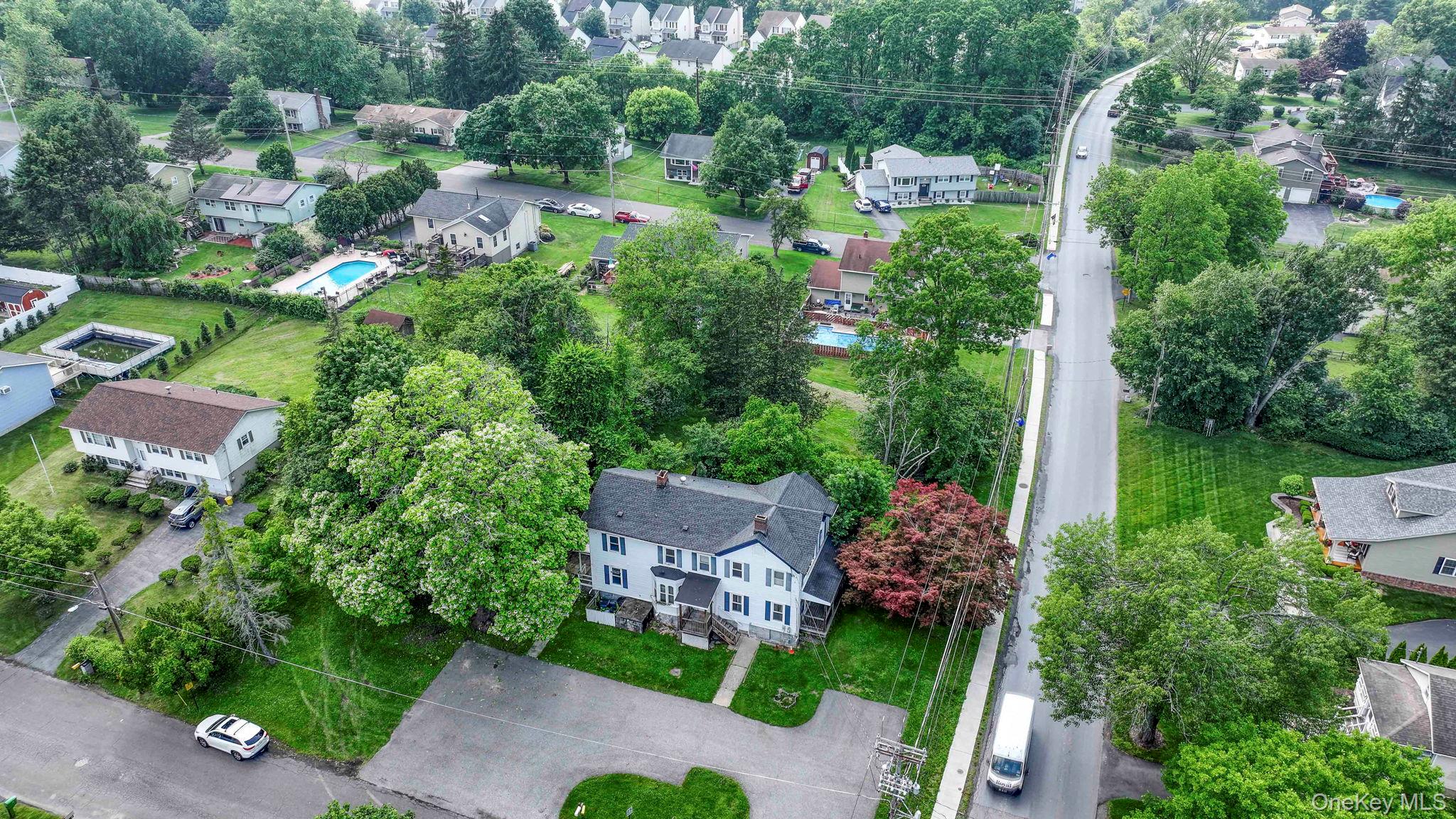 265 Goodwill Road Montgomery, NY 12549 - Photo 5 of 41 Aerial view of residential area with a tree filled landscape