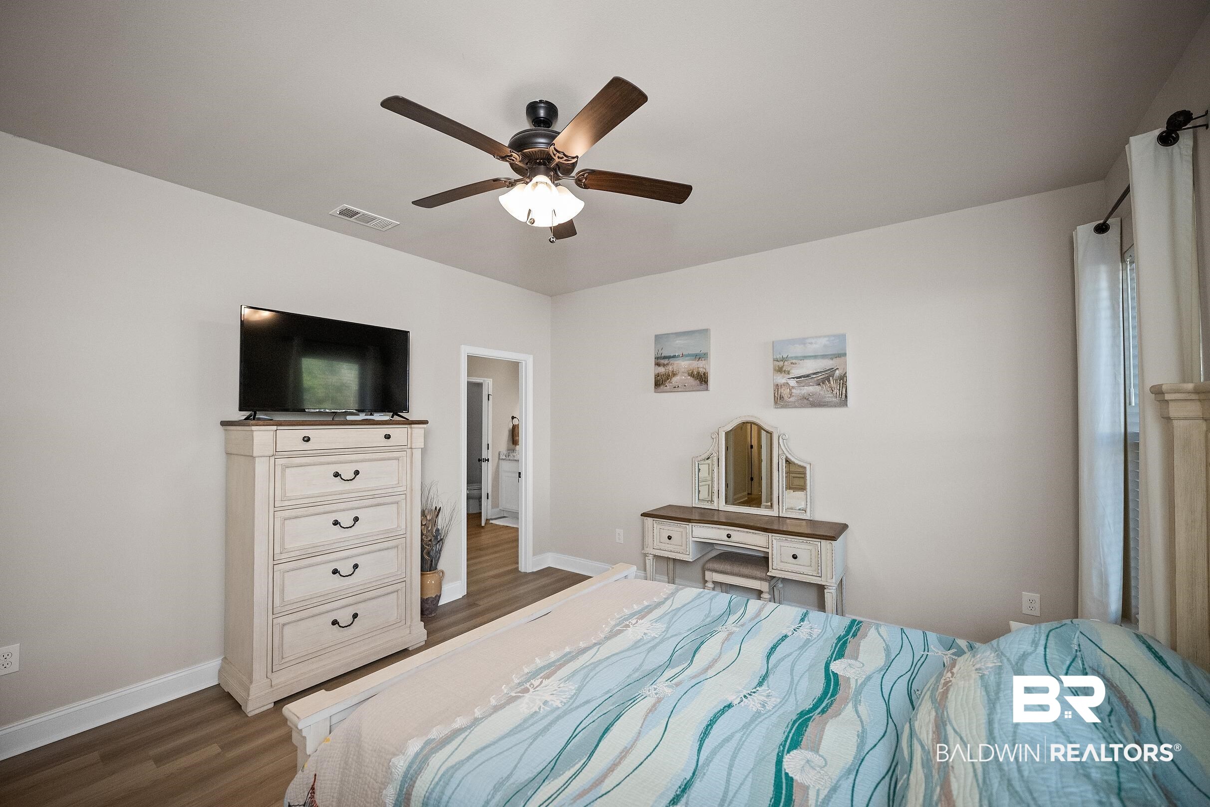 1077 Stella Road Foley, AL 36535 - Photo 20 of 27 Bedroom featuring ceiling fan and dark wood-style floors