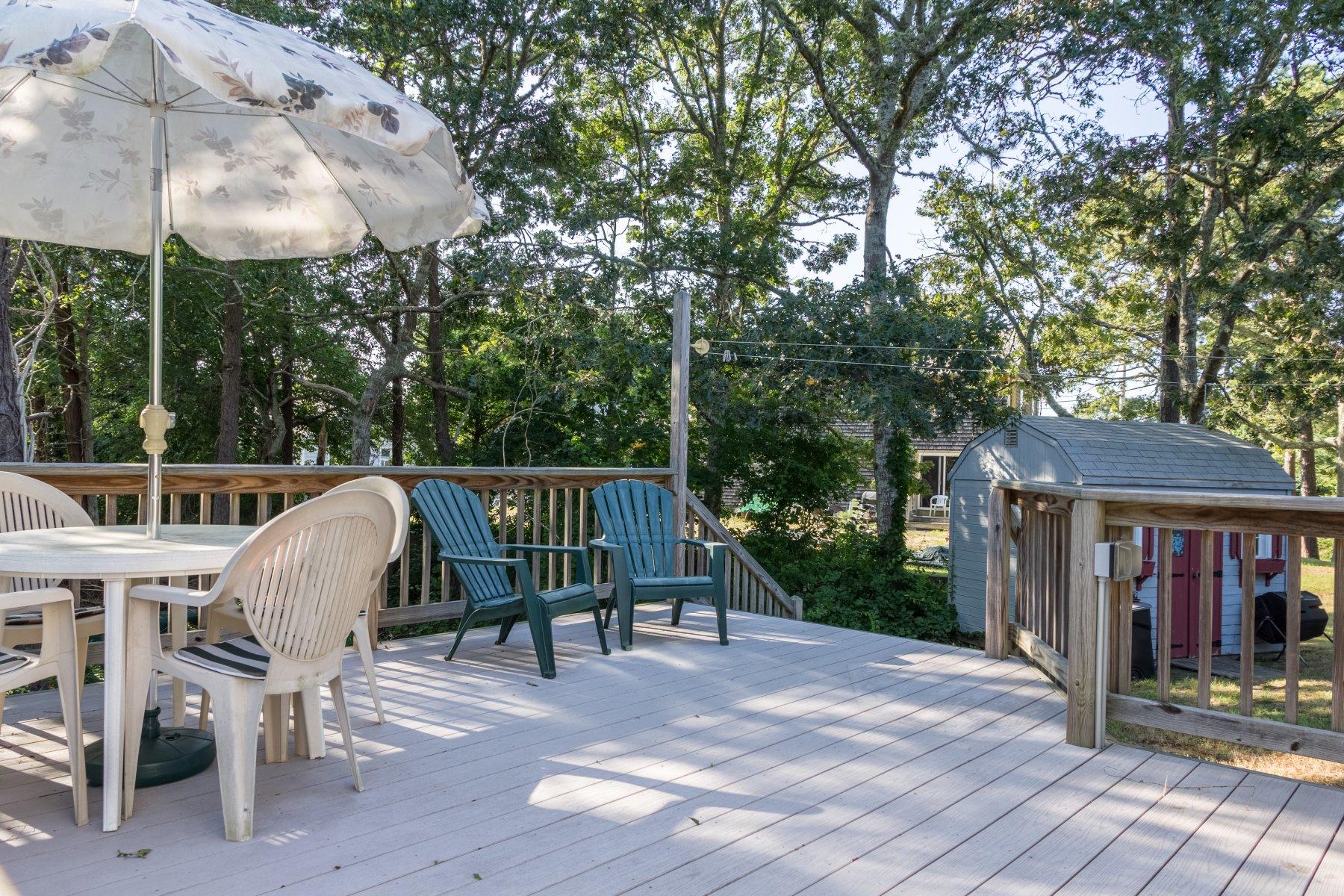 2 Otis Kelly Road Dennis Port, MA 02639 - Photo 4 of 23 a view of a chairs and table in the patio