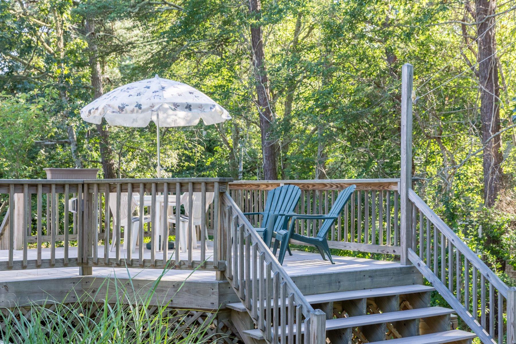 2 Otis Kelly Road Dennis Port, MA 02639 - Photo 6 of 23 a view of a balcony with wooden floor