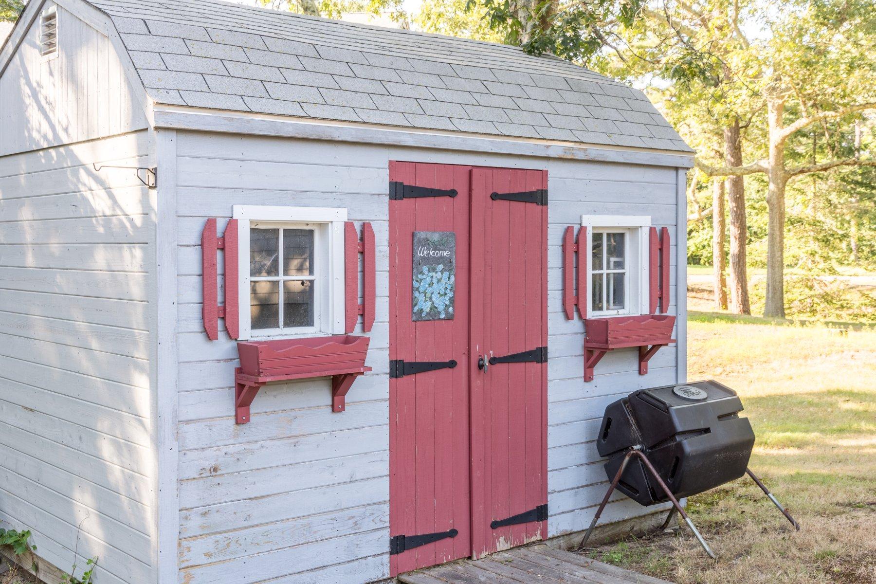 2 Otis Kelly Road Dennis Port, MA 02639 - Photo 8 of 23 a front view of a house with outdoor seating