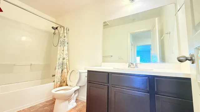 a view of empty room with windows