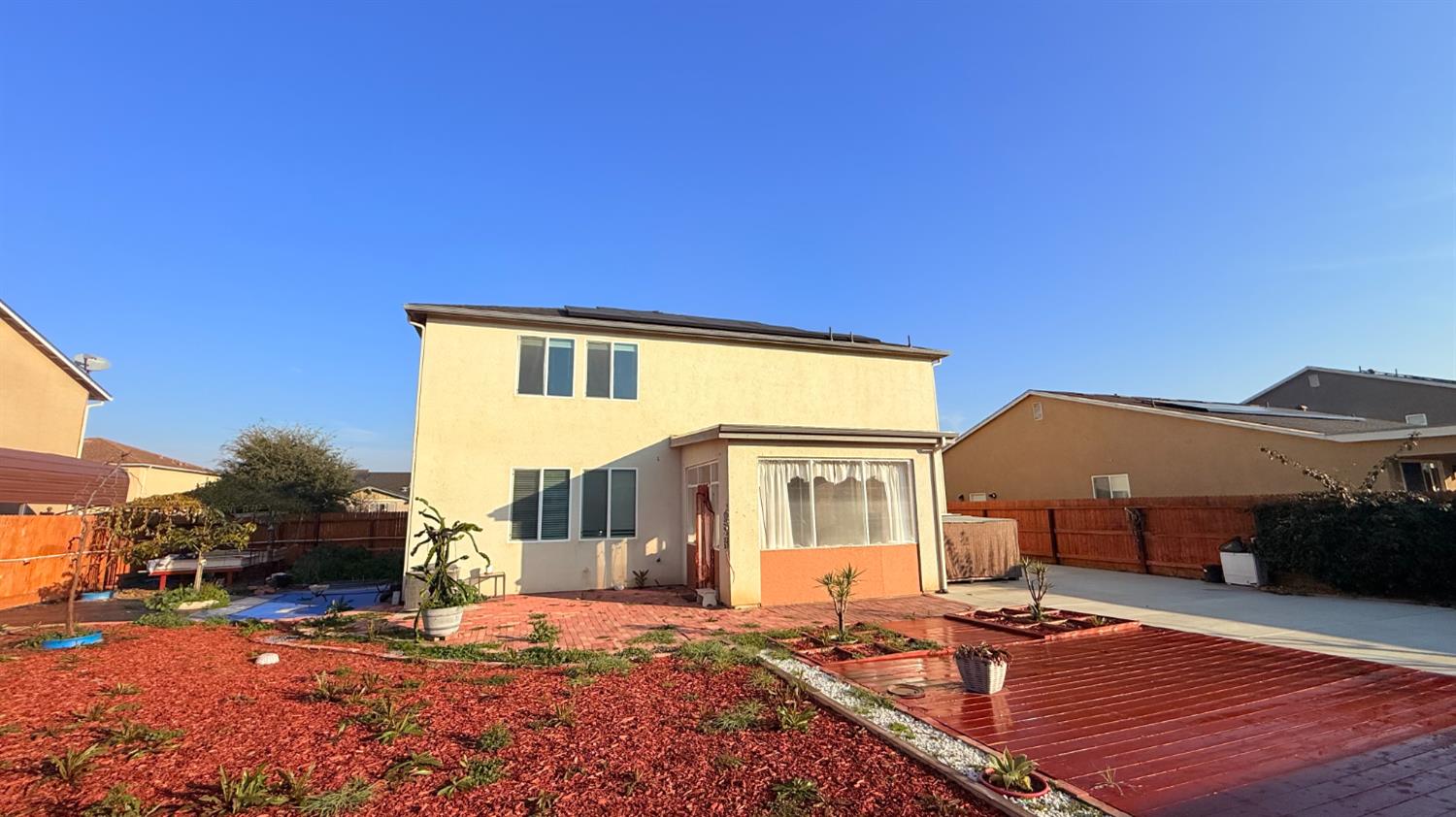 3935 East Myrtle Avenue Visalia, CA 93292 - Photo 35 of 41 a view of a house with backyard and sitting area