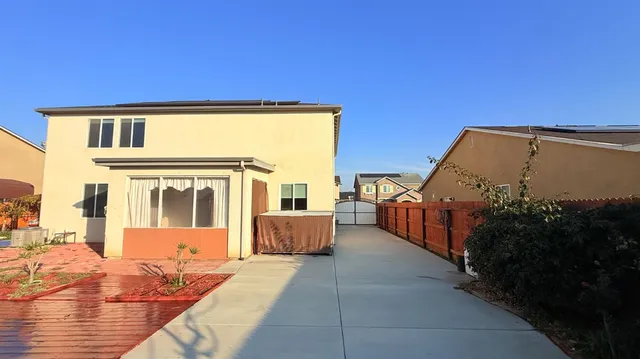 a view of backyard with seating space