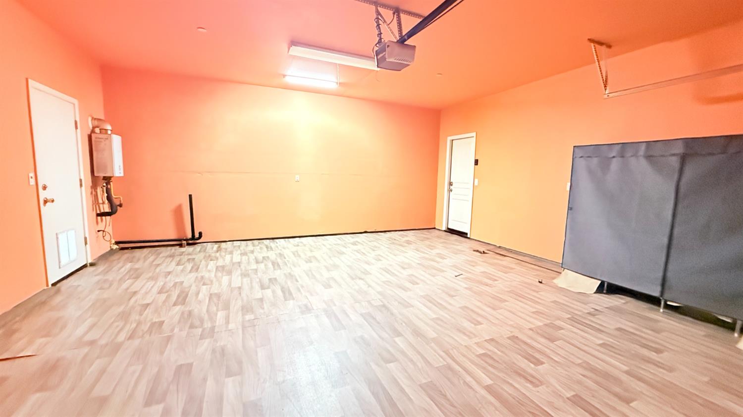 3935 East Myrtle Avenue Visalia, CA 93292 - Photo 40 of 41 an empty room with wooden floor