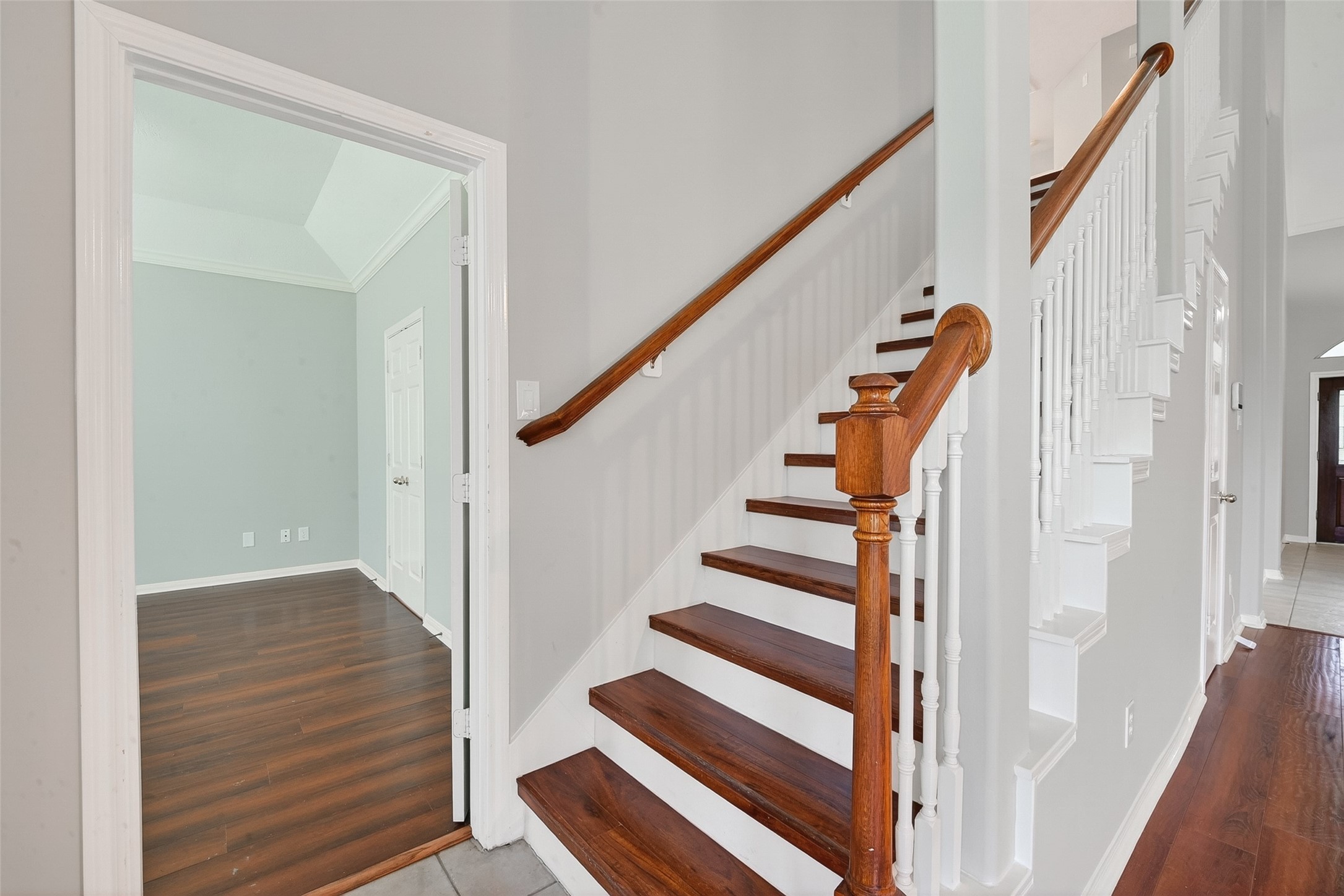 14308 Rocky Briar Lane Rosharon, TX 77583 - Photo 21 of 46 a view of staircase with wooden floor and white walls