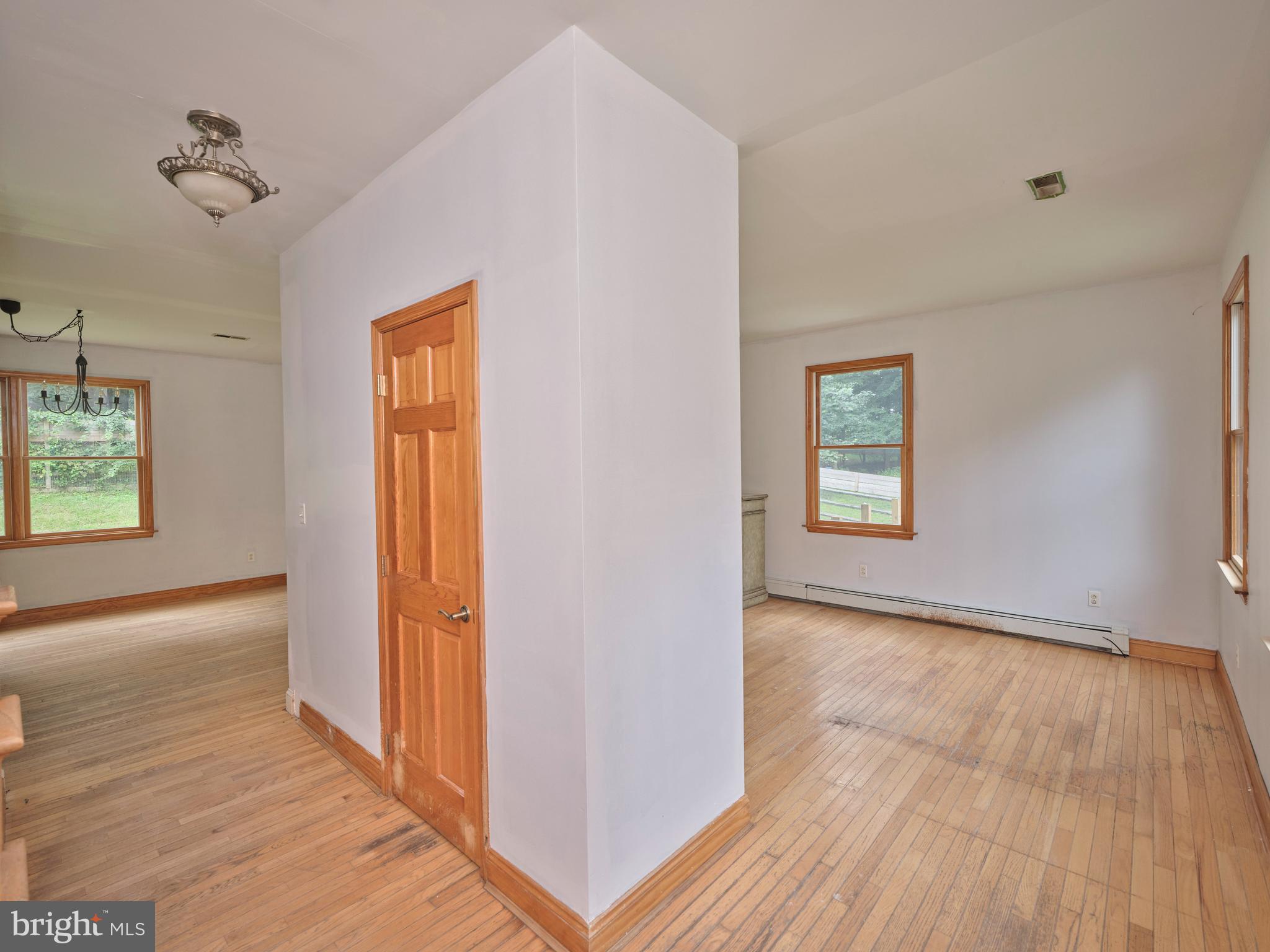 130 Rattlesnake Road Kintnersville, PA 18930 - Photo 18 of 29 wooden floor in an empty room with a window