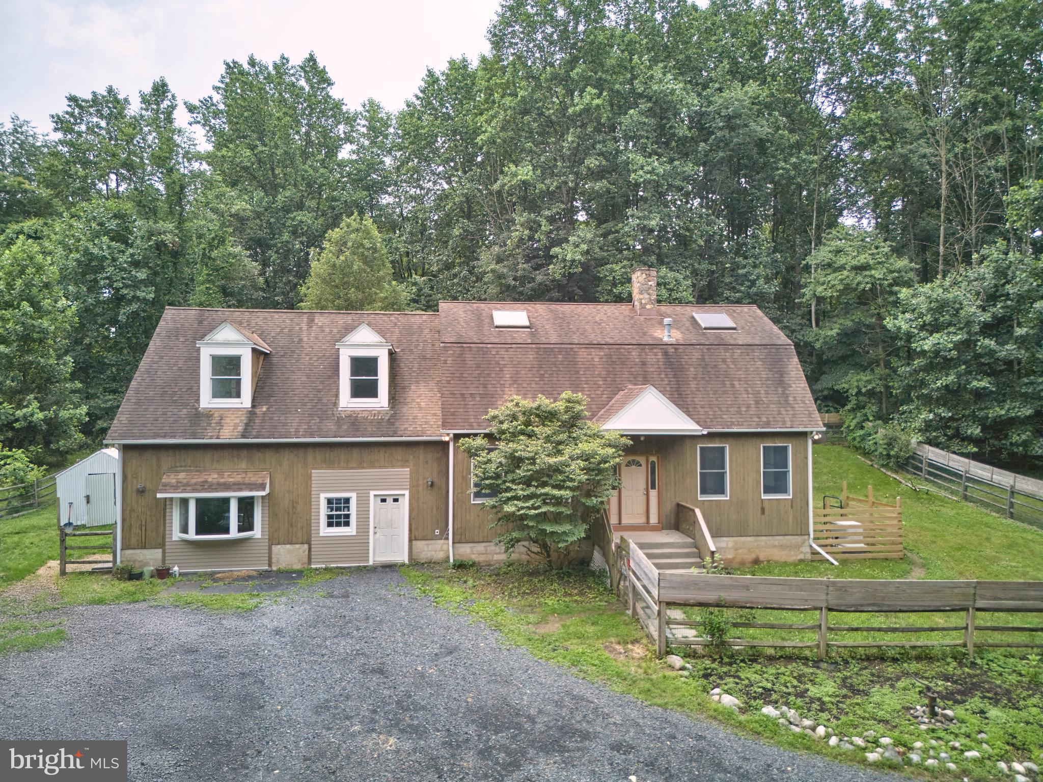 130 Rattlesnake Road Kintnersville, PA 18930 - Photo 3 of 29 a front view of a house with a yard