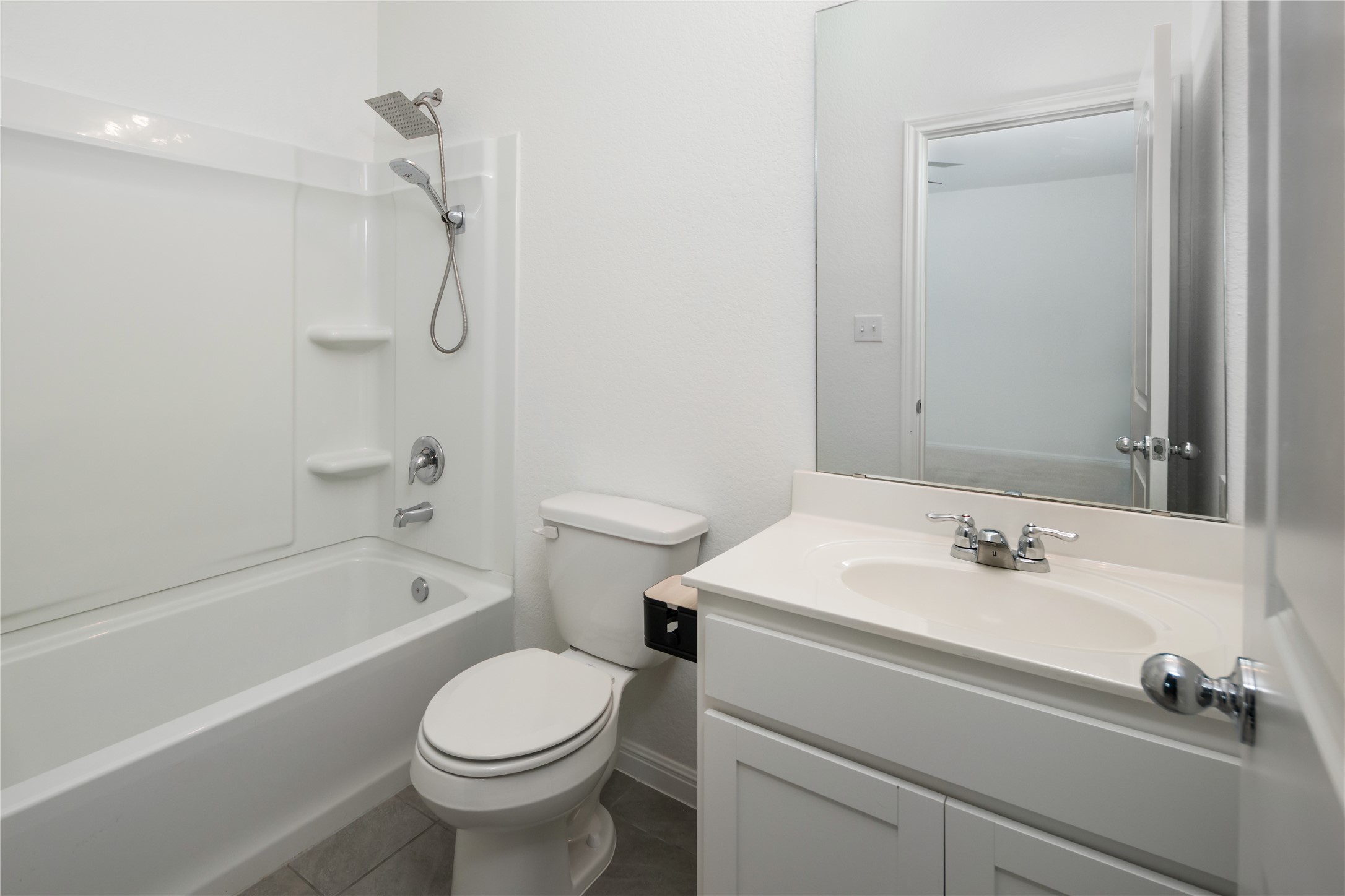 2540 Acoma Lane Leander, TX 78641 - Photo 15 of 26 a bathroom with a sink toilet and shower