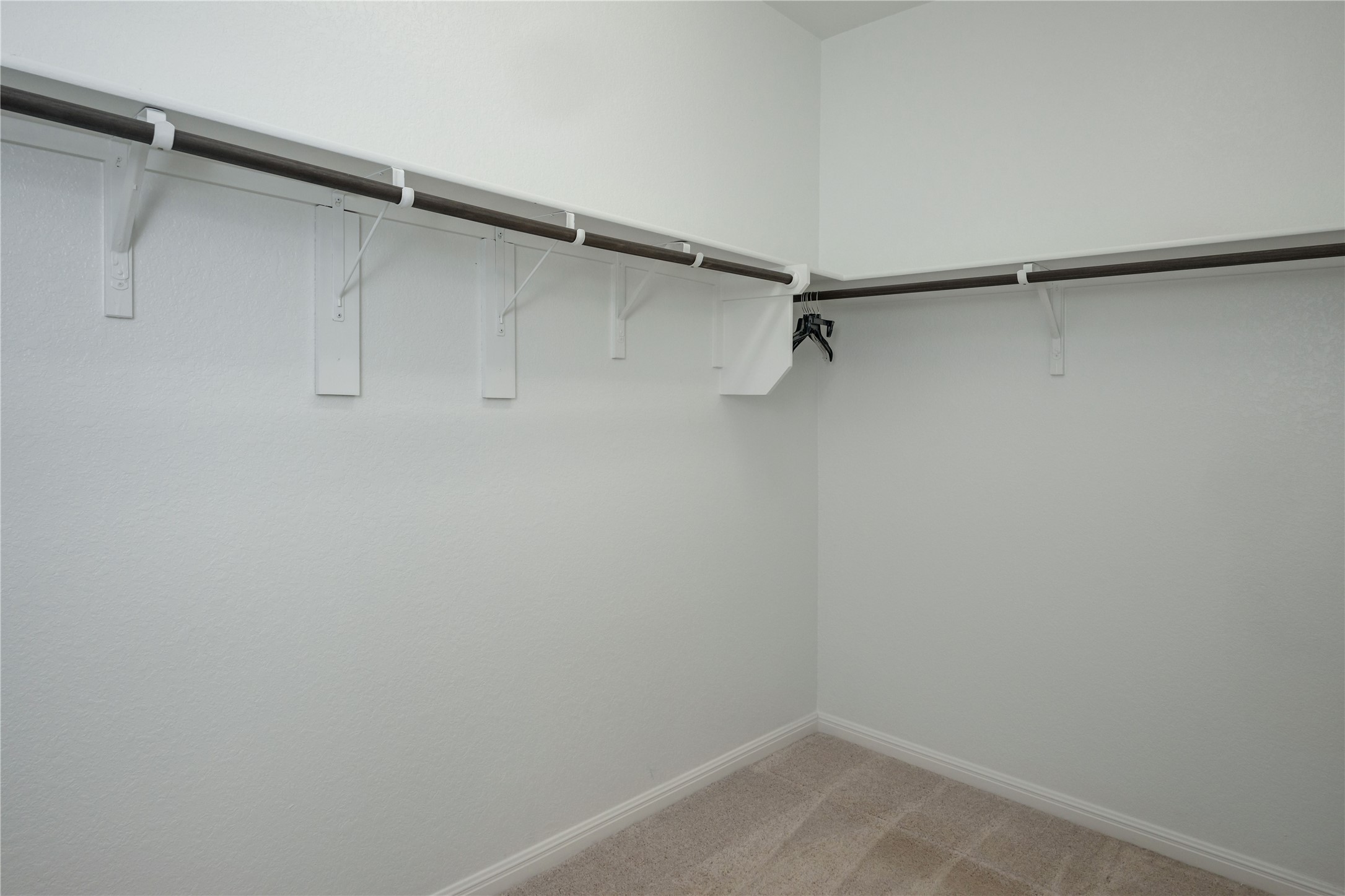 2540 Acoma Lane Leander, TX 78641 - Photo 19 of 26 a view of a room with racks on the wall