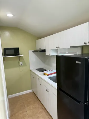 $1,350 | 4204 North Browning Drive, Unit EFFICIENCY IN BACK, Gun Club Estates, FL 33406