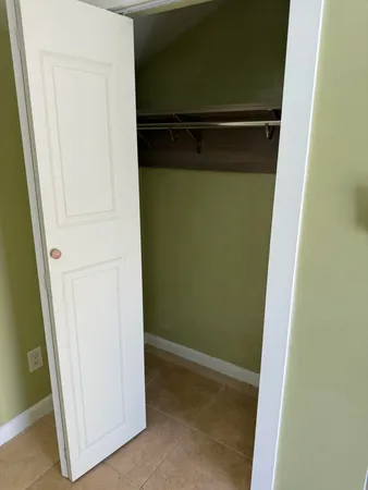 a bathroom with a toilet and a bathtub