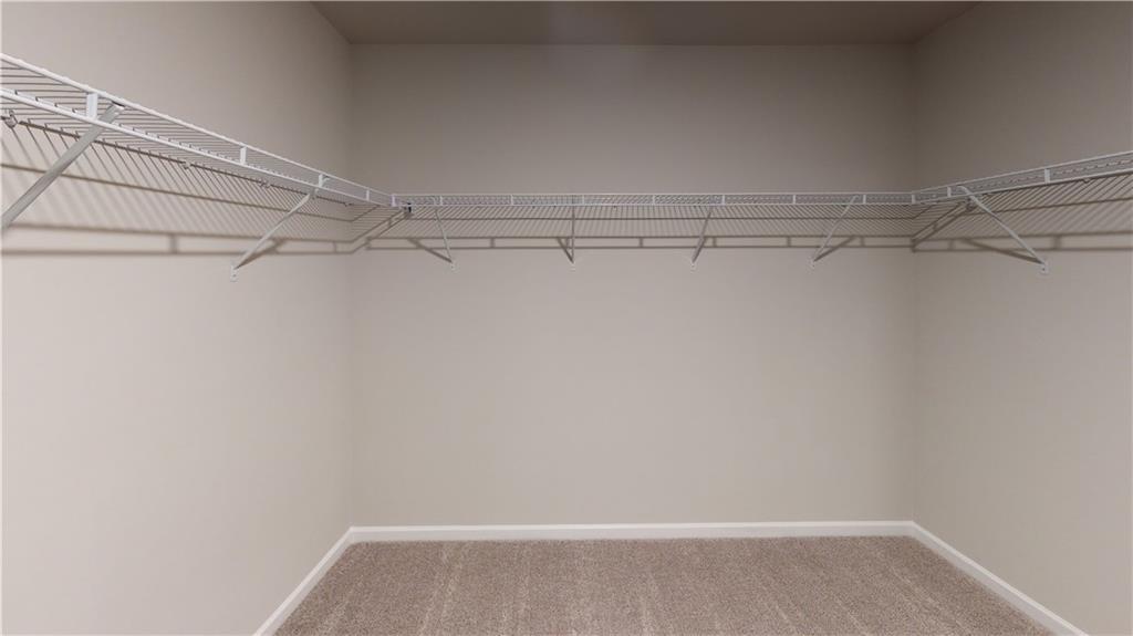 27 Stonebrook Drive Rome, GA 30165 - Photo 19 of 22 a view of a room with racks on the wall