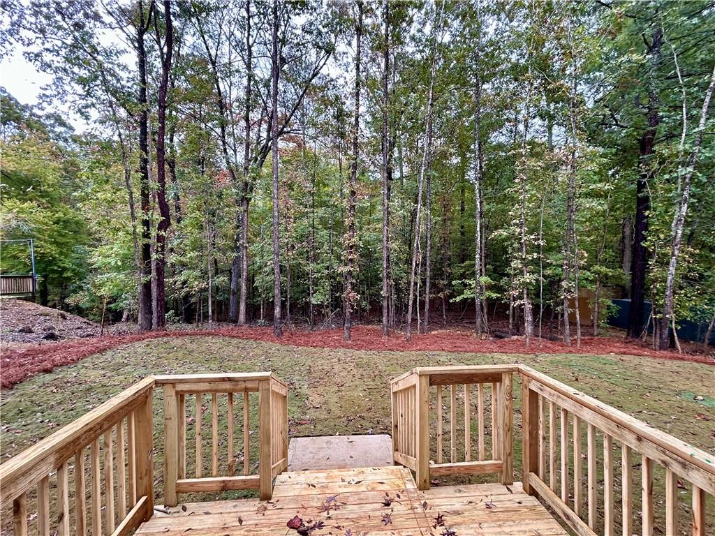 27 Stonebrook Drive Rome, GA 30165 - Photo 4 of 22 a view of a yard with plants and trees