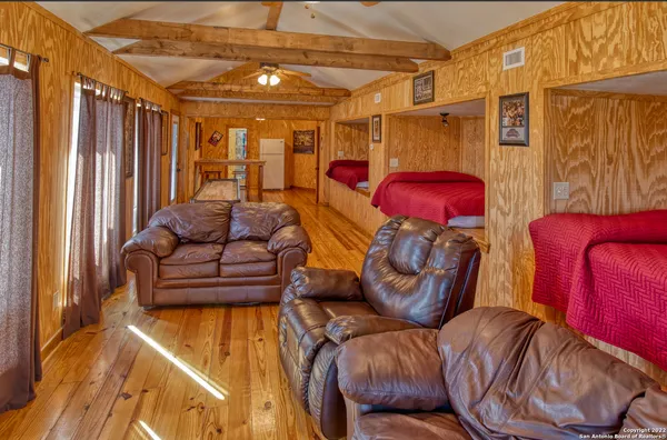 a living room with furniture and a couch
