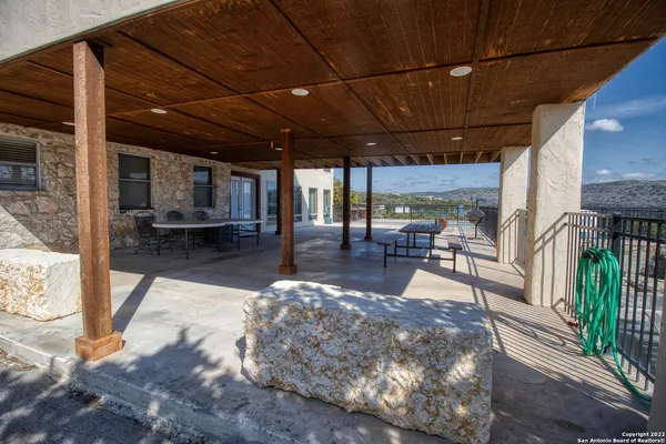 a view of a porch with furniture