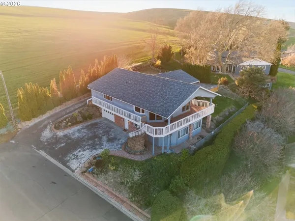 a view of a house with a ocean view