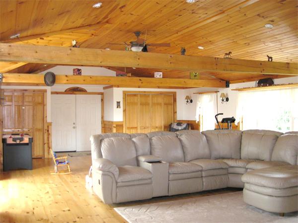42 J Davis Road Charlton, MA 01507 - Photo 7 of 30 a view of a livingroom with furniture and a flat screen tv