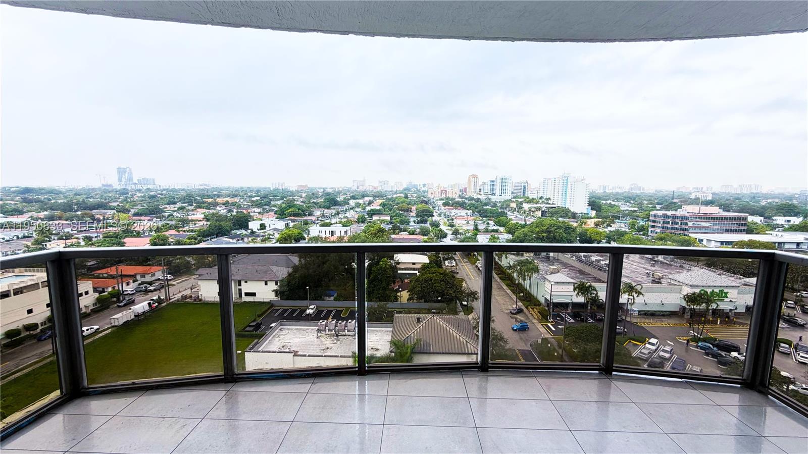 2301 Southwest 27th Avenue, Unit 1200 Miami, FL 33145 - Photo 13 of 24 a view of a balcony with city view