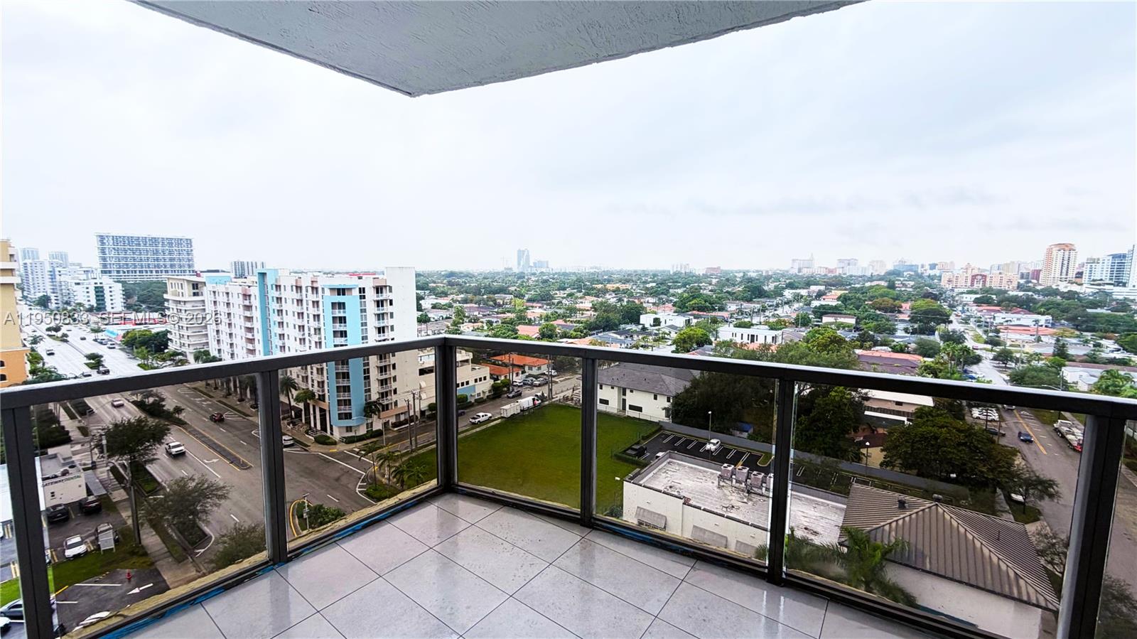 2301 Southwest 27th Avenue, Unit 1200 Miami, FL 33145 - Photo 14 of 24 a view of city from a balcony