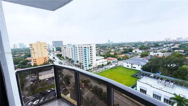 a view of swimming pool from a balcony