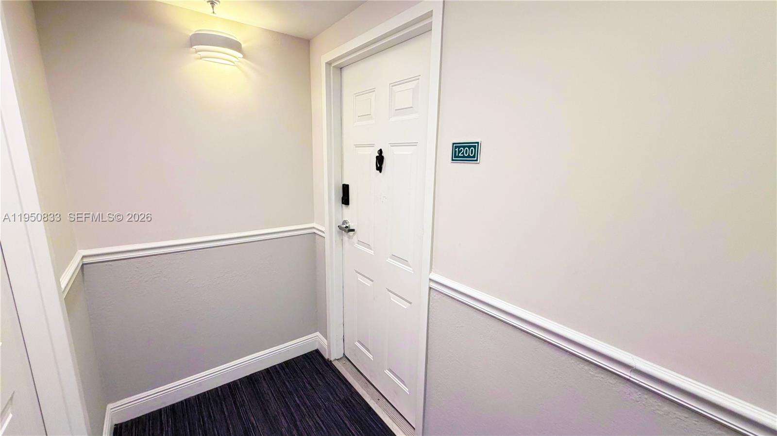 2301 Southwest 27th Avenue, Unit 1200 Miami, FL 33145 - Photo 2 of 24 a view of small space with racks on the wall