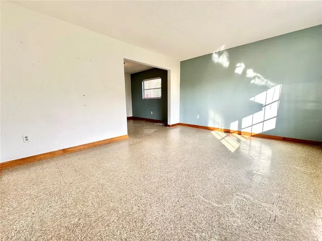 an empty room with a window