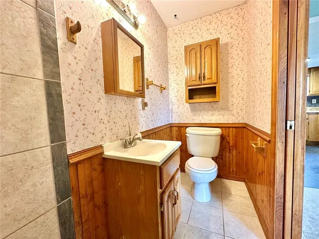 a bathroom with a sink a toilet and a bathtub