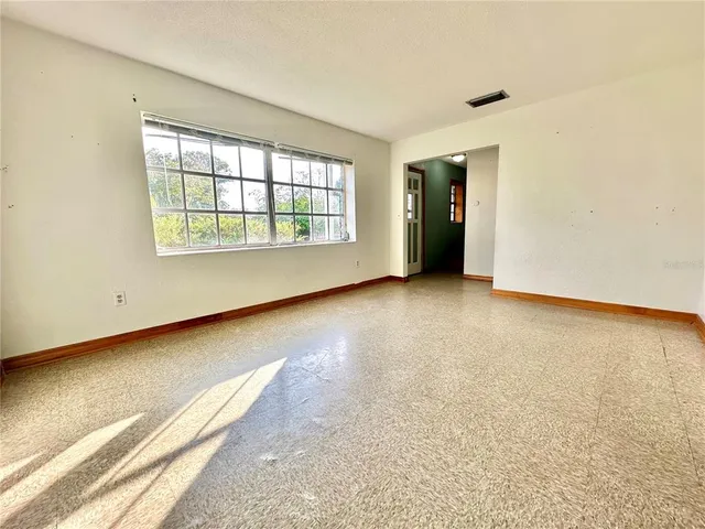 an empty room with windows