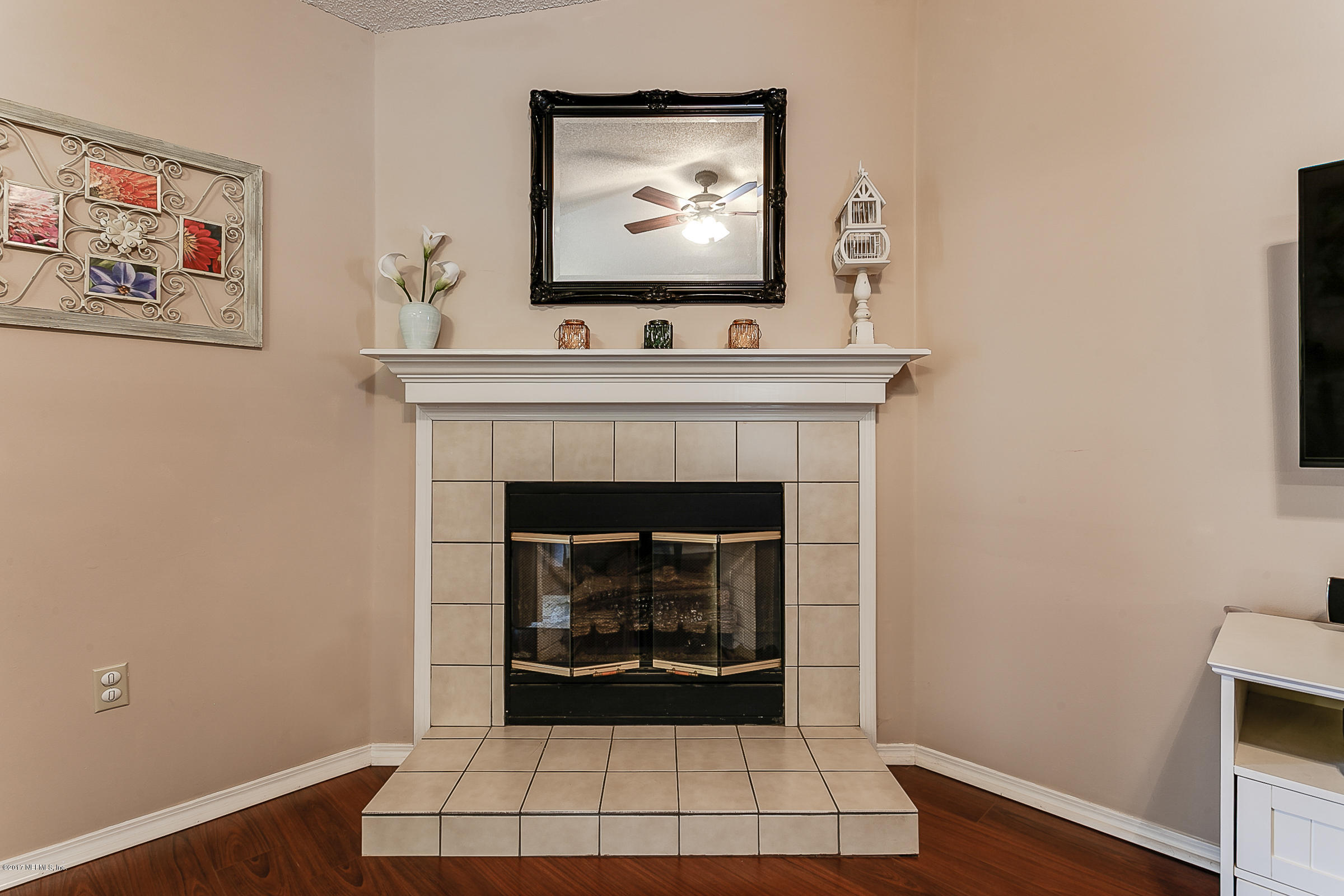 1270 Cutlass Road Orange Park, FL 32065 - Photo 13 of 28 a living room with a fireplace