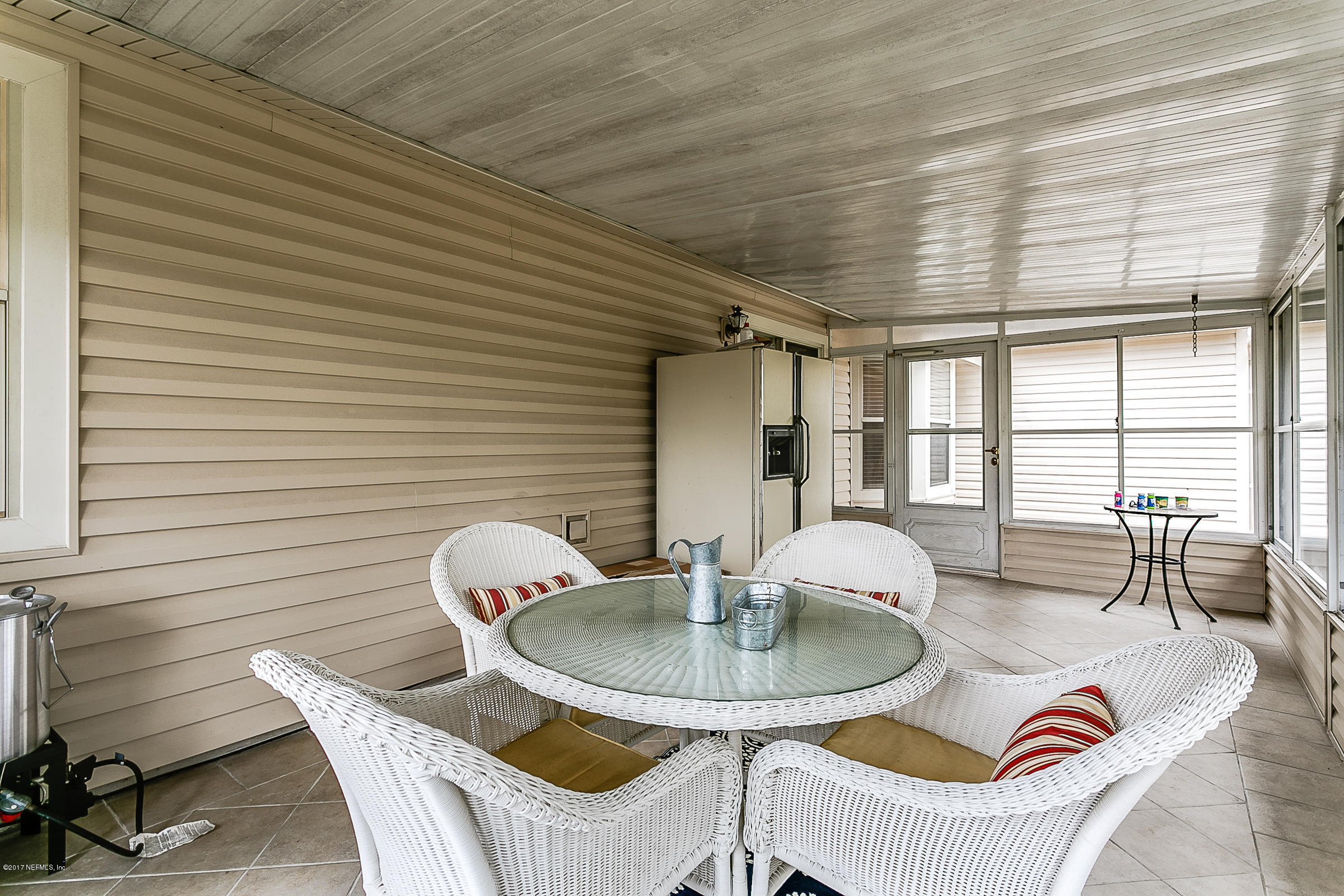 1270 Cutlass Road Orange Park, FL 32065 - Photo 25 of 28 a dining room with furniture and wooden floor