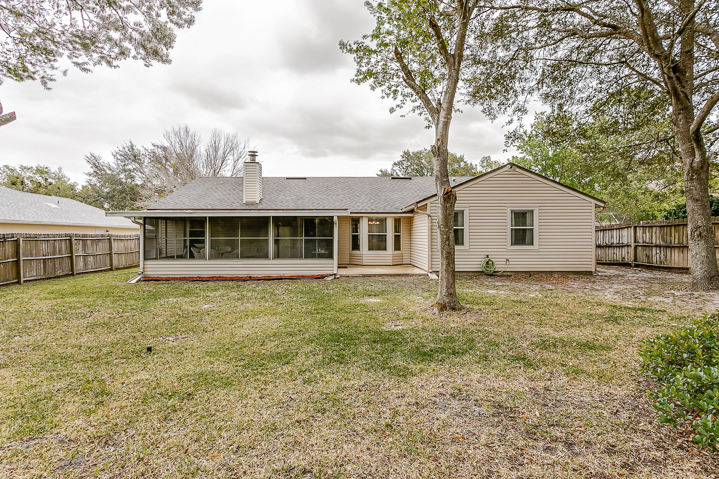 1270 Cutlass Road Orange Park, FL 32065 - Photo 28 of 28 a front view of a house with a garden